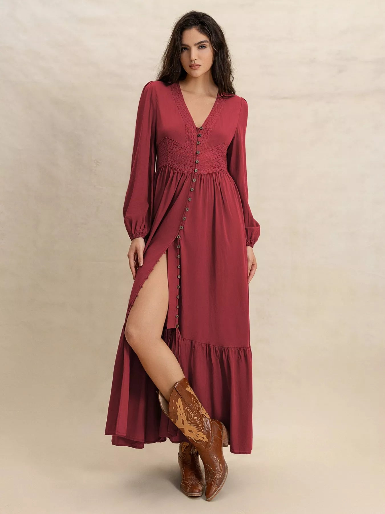 Burgundy V-neck maxi dress with button-front bodice, long balloon sleeves, and side slit