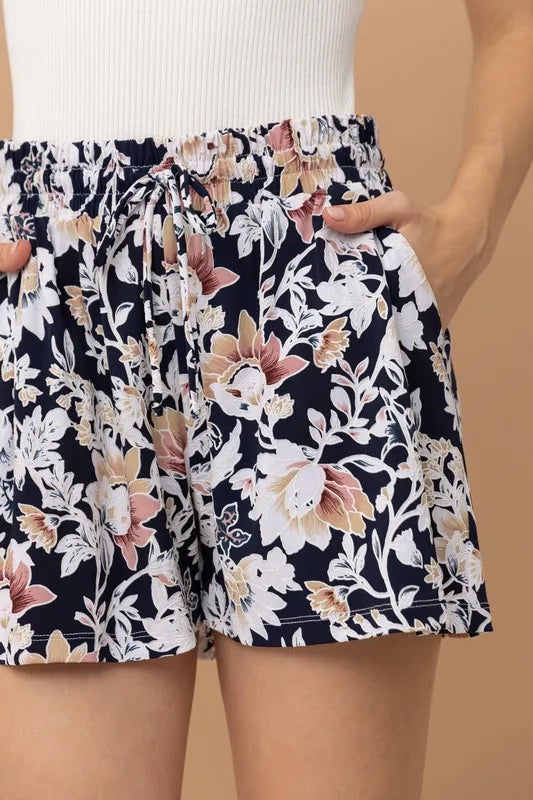 Floral print shorts close-up with ruched elastic waistband