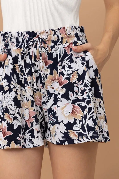Floral print shorts close-up with ruched elastic waistband