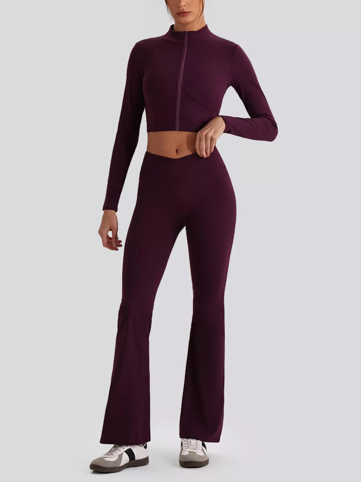 Plum purple V-neck crop top and flared-leg leggings set, full-body view