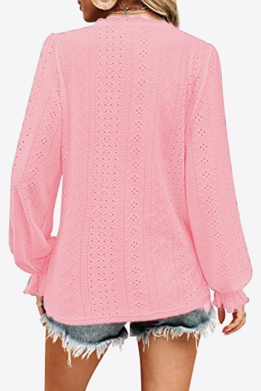 Pink eyelet blouse back view with long gathered cuffs