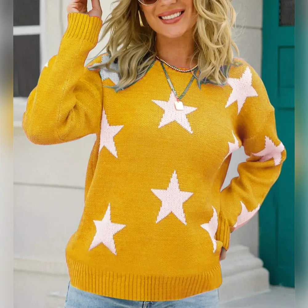 Yellow round-neck sweater with white star pattern and ribbed knit trim