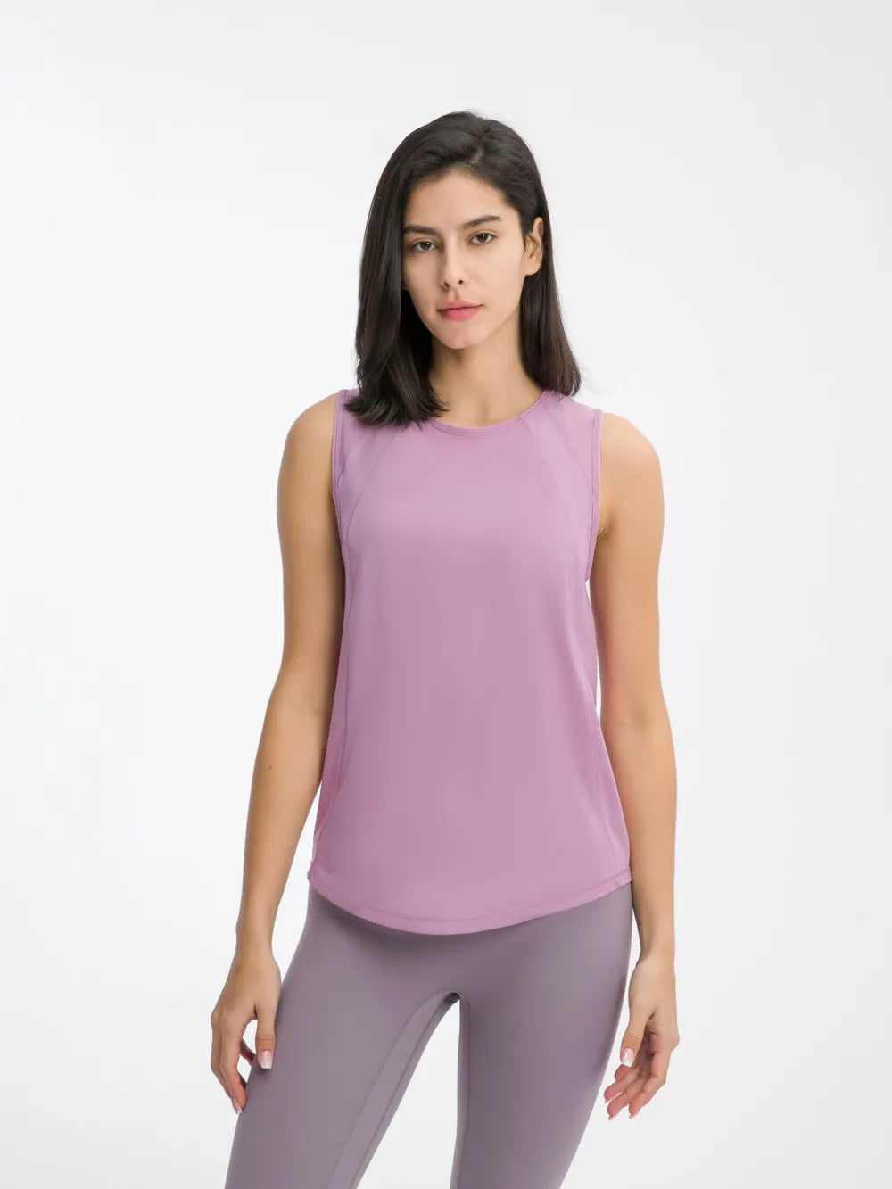 Purple active tank top with sleeveless crew neck and curved hem