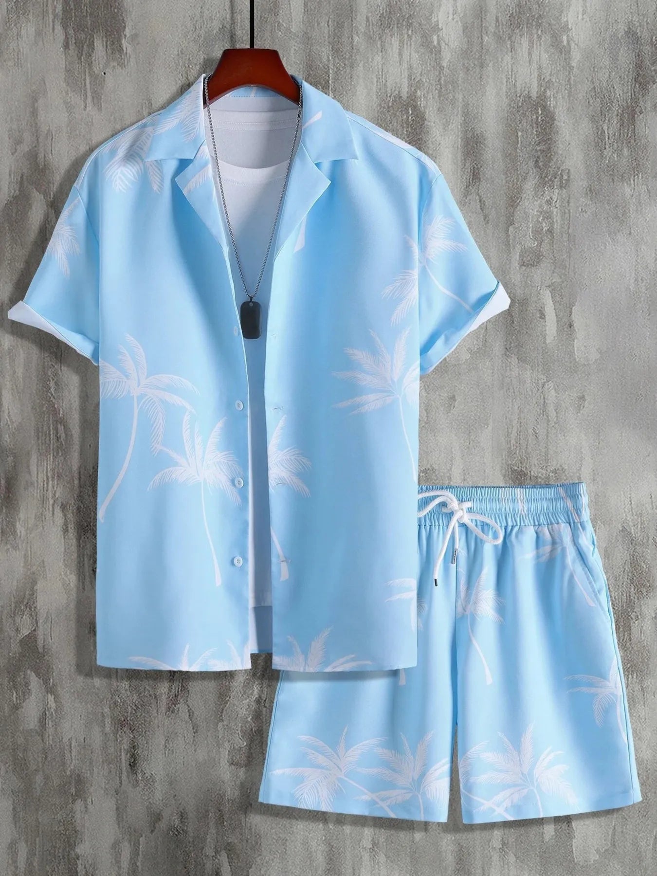 Men's palm print button-up shirt and shorts set, light blue with white palm fronds.