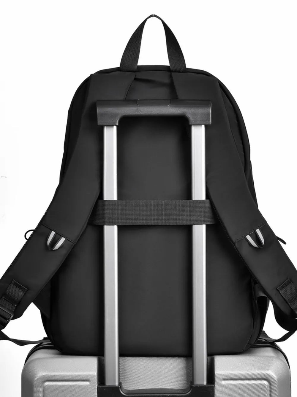 Black backpack with rigid back support, adjustable shoulder straps, and front pocket