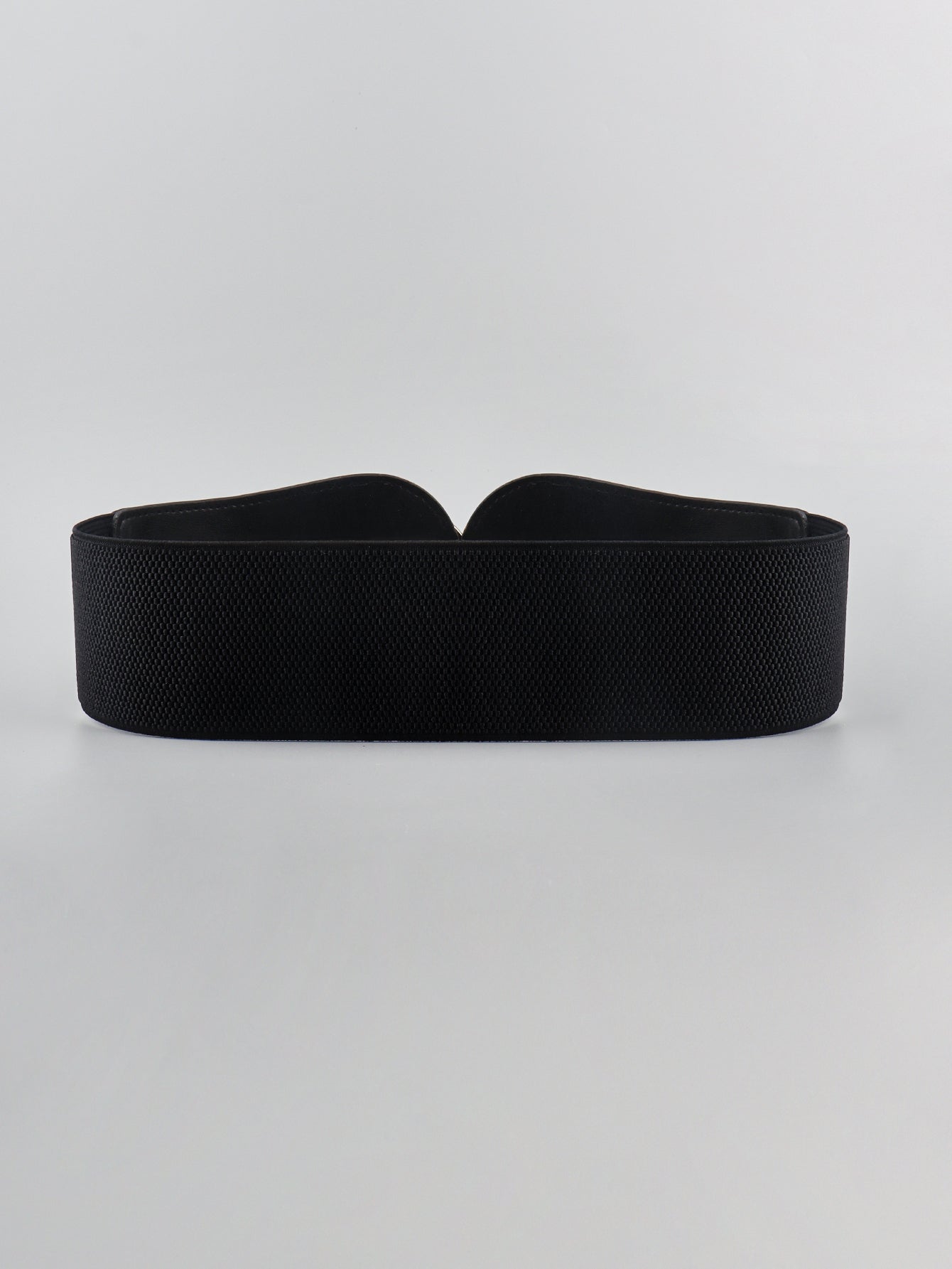 Black wide elastic belt with textured finish and curved center band design