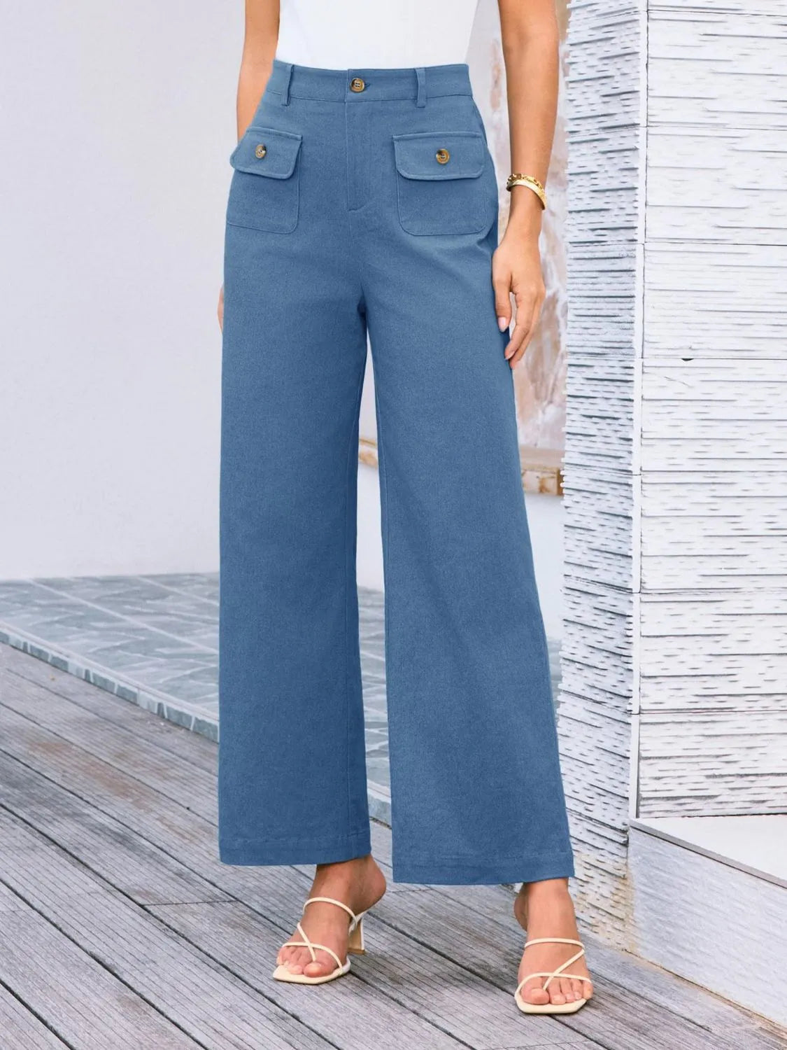 High waist wide leg pants in dusty blue with front button and two flap pockets