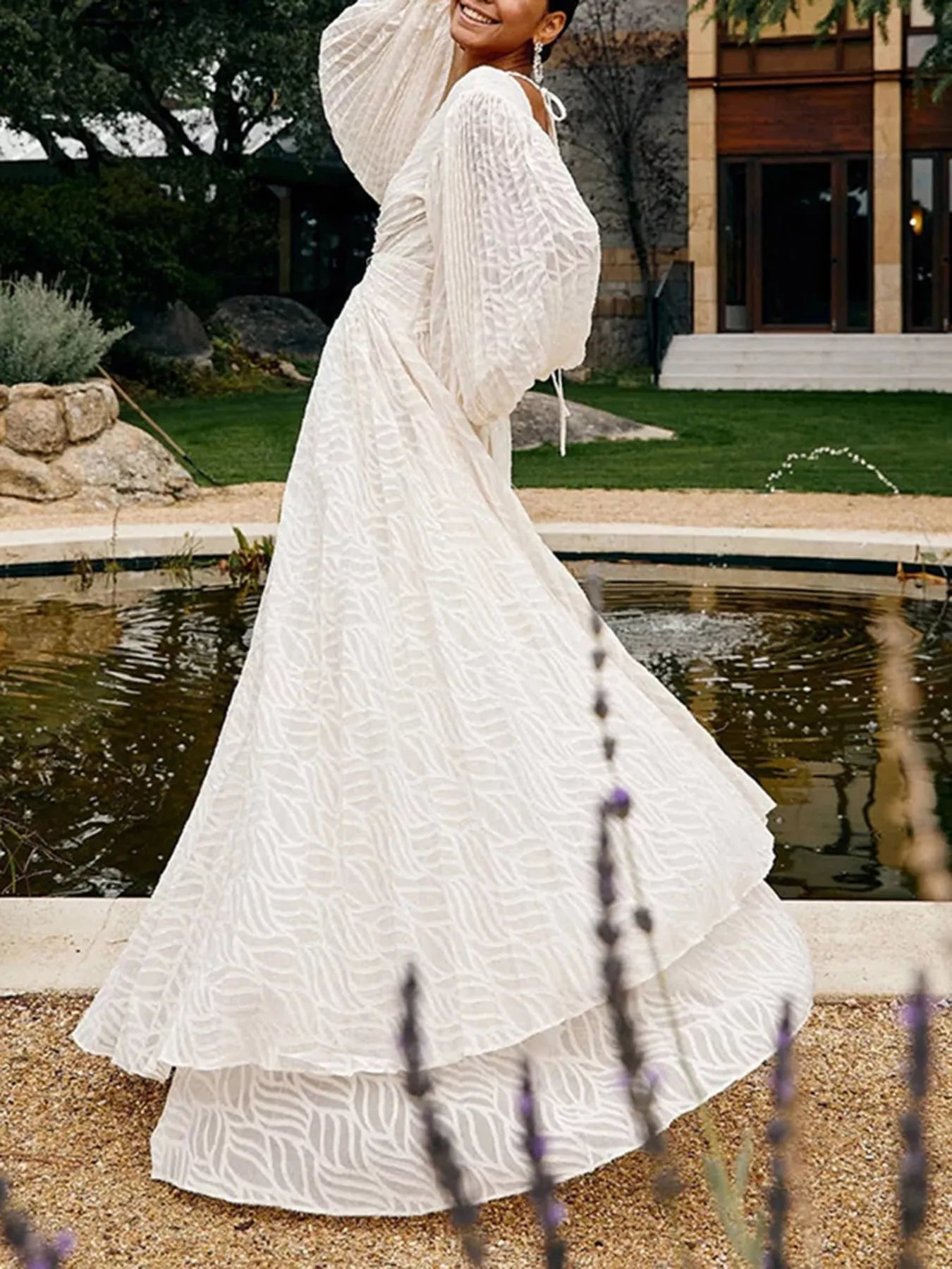 Cedar & Moore V-Neck Long Sleeve Maxi Dress in white with tie-back and zipper detail