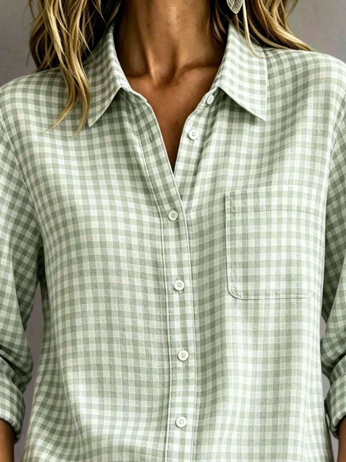 Light green gingham button-down shirt with chest pocket, long sleeves, and button placket.