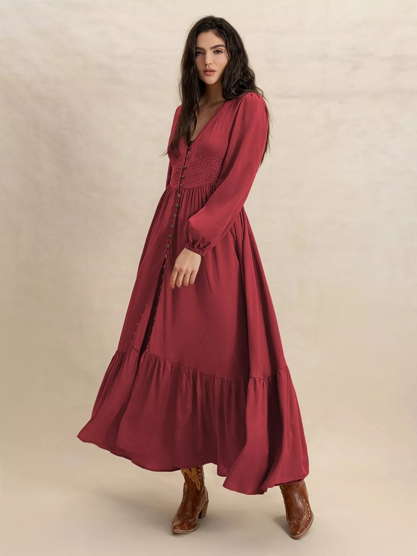 Burgundy V-neck maxi dress with gathered waist and tiered skirt with ruffled hem