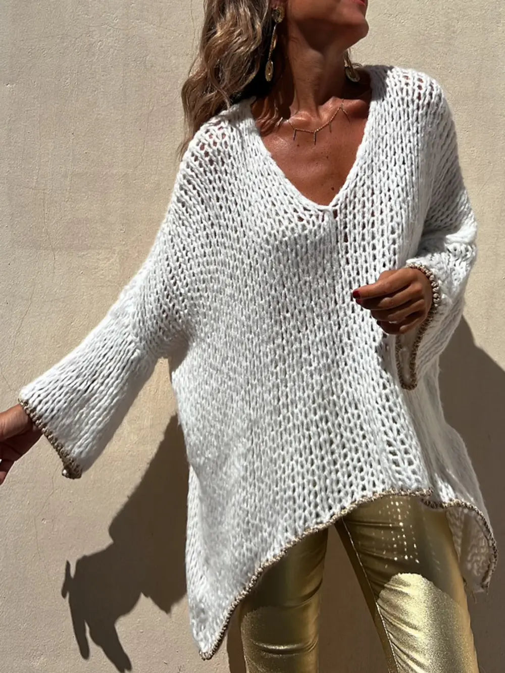 White textured knit V-neck long sleeve sweater with draped asymmetric hem