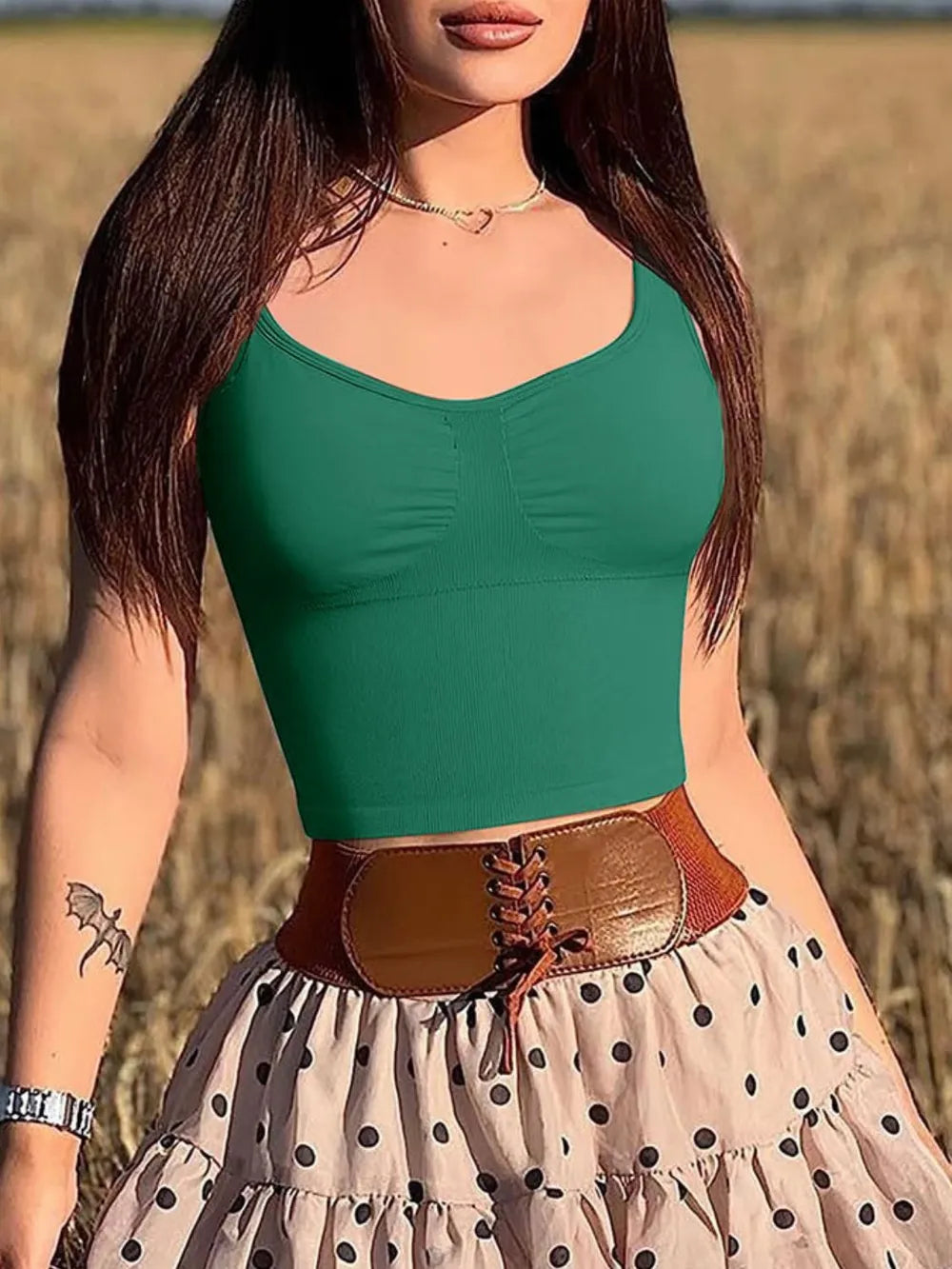 Green wide-strap active tank with scoop neck and ruched bust seams