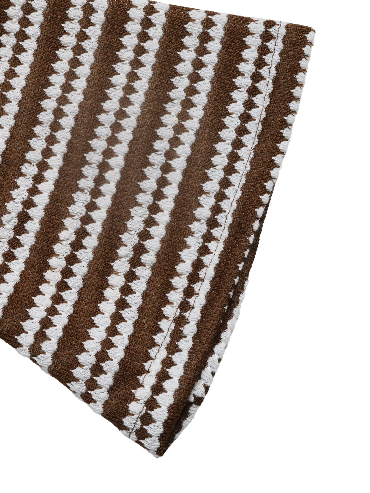 Brown and white striped ribbed knit fabric panel on a dress hem