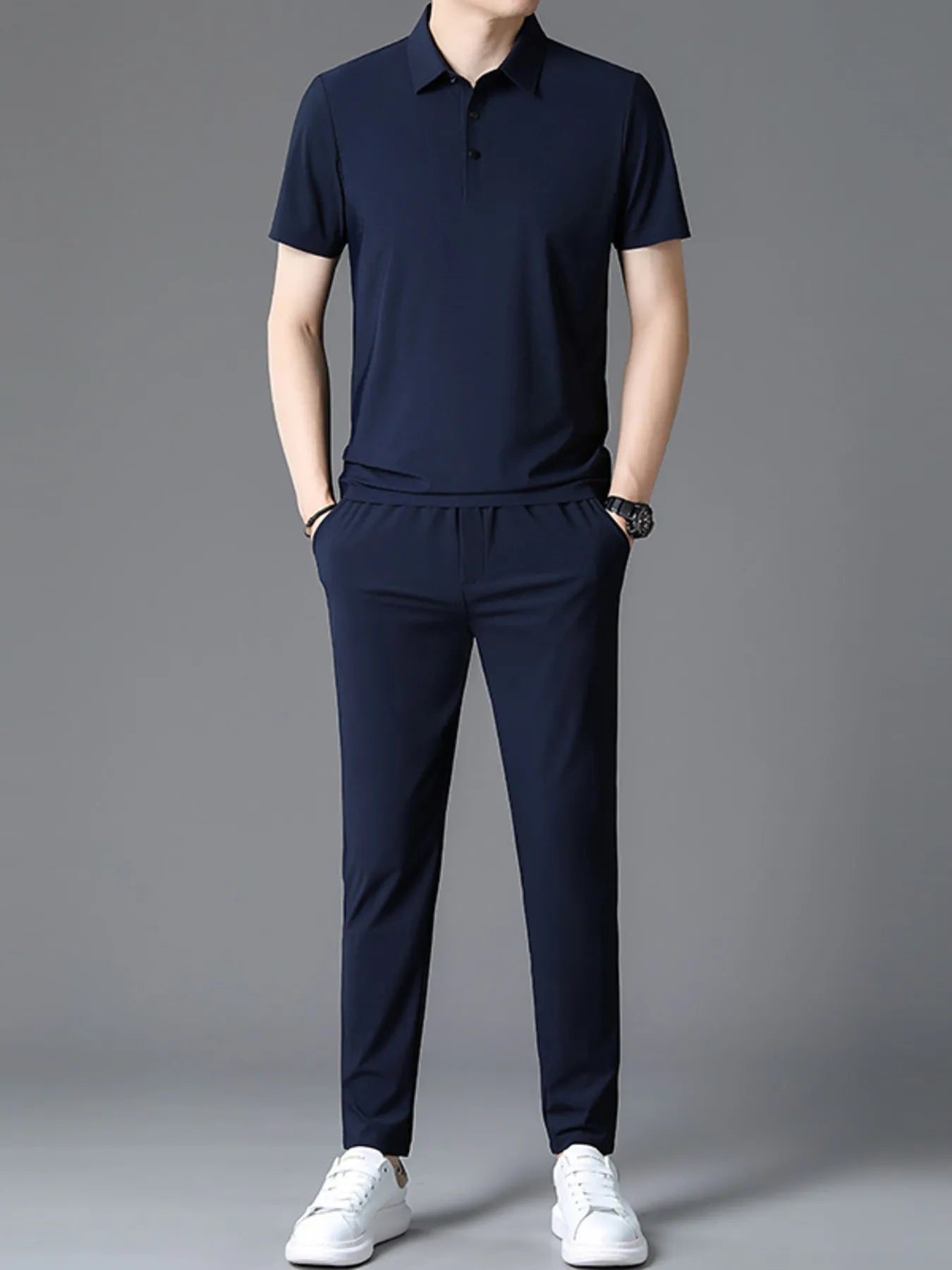 Men's polo and drawstring pants set in dark navy, short sleeves, button placket