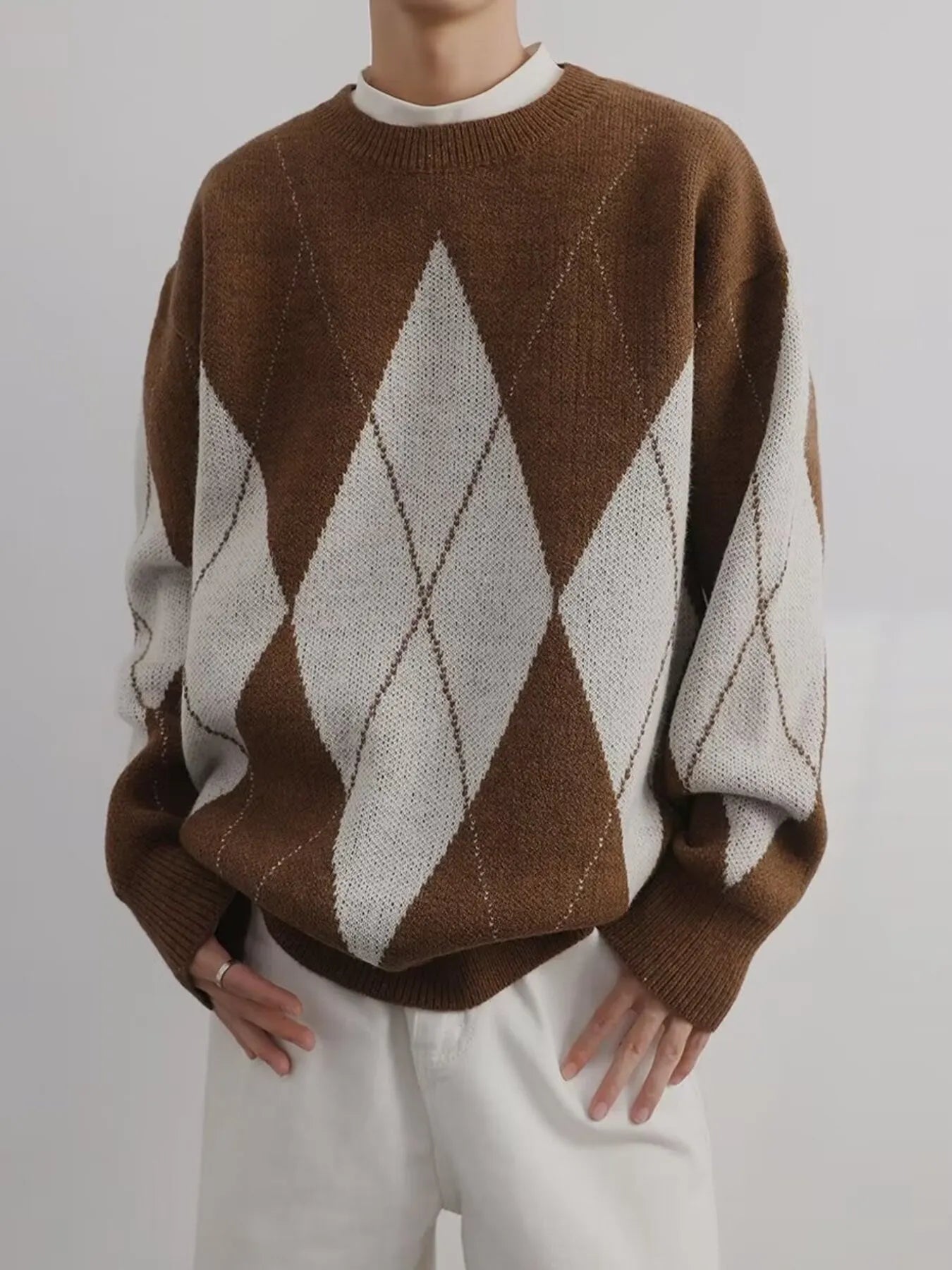 Brown and cream argyle oversized knit sweater with diamond pattern, ribbed cuffs