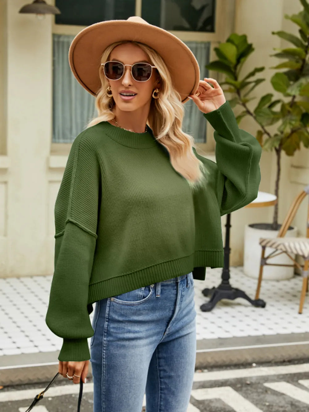 Army green round-neck lantern sleeve sweater with ribbed cuffs and hem