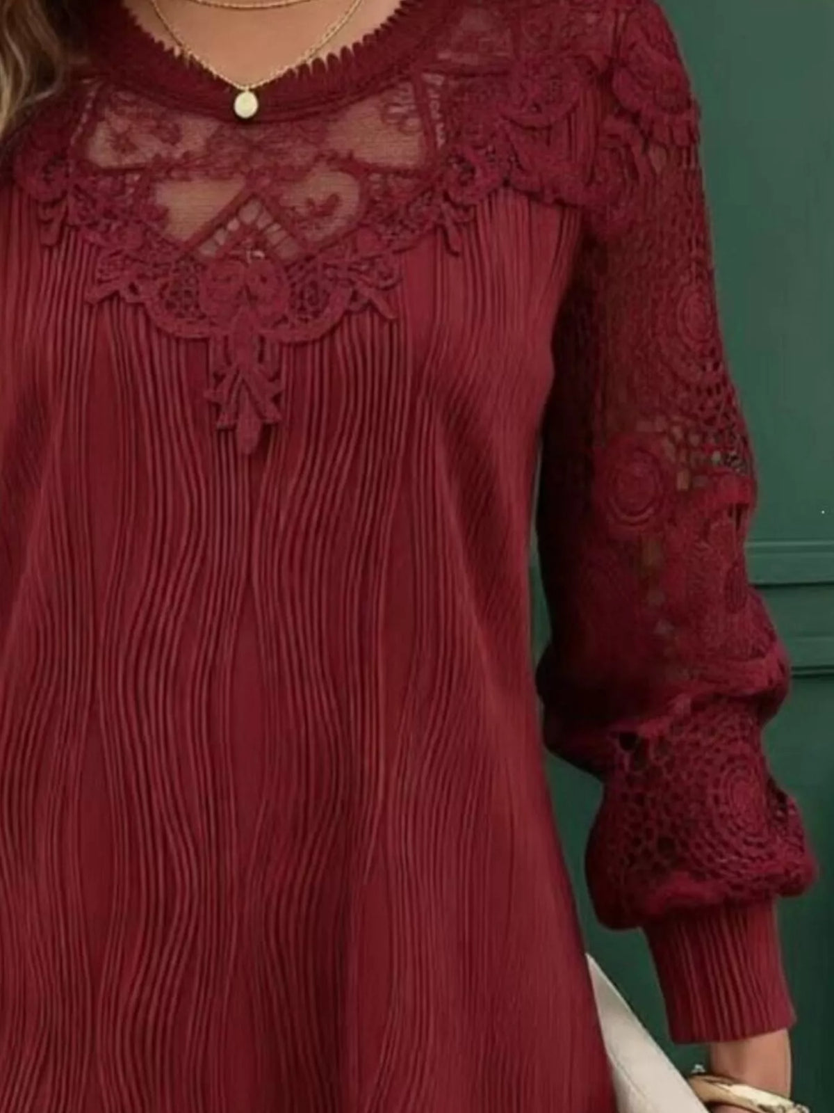 Burgundy lace patchwork long-sleeve blouse with scalloped neckline and textured sleeves