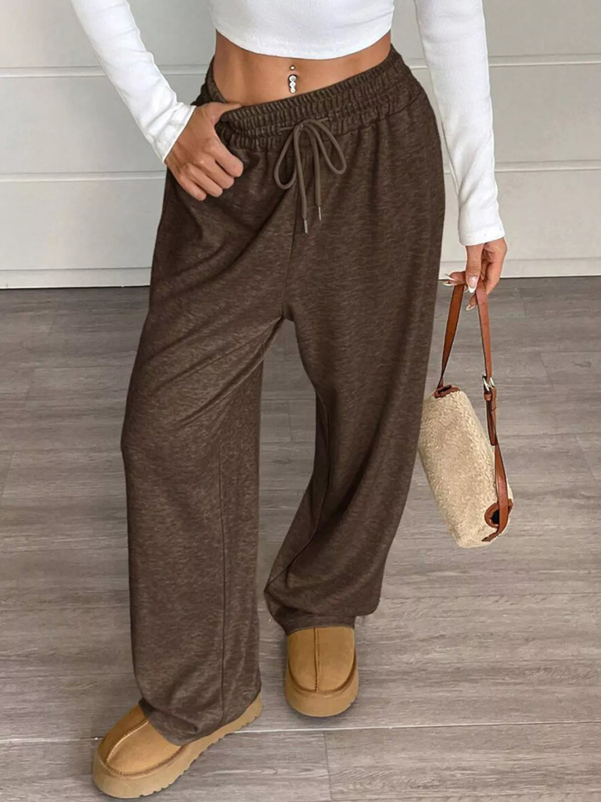 Dark brown high-waist drawstring wide-leg pants with elastic waistband and side pockets