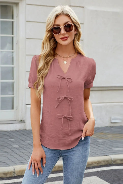 Dusty pink bow-notched short sleeve blouse with tie-front detail