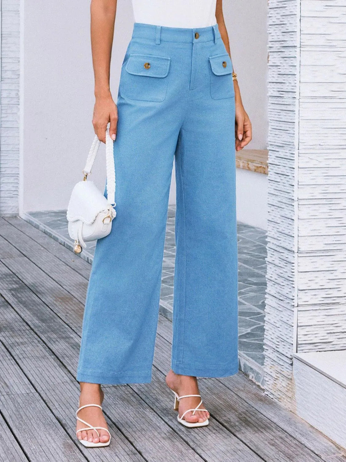 Sky blue high-waist wide-leg pants with front patch pockets and wide straight hems