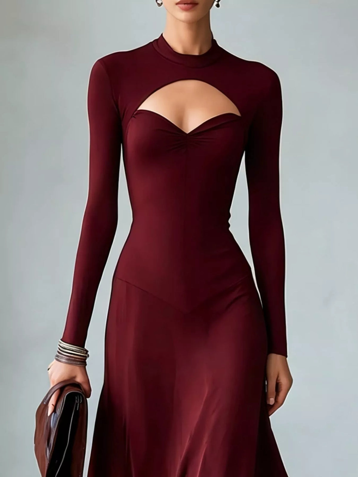 Burgundy mock neck long sleeve midi dress with cutout bust and fitted silhouette