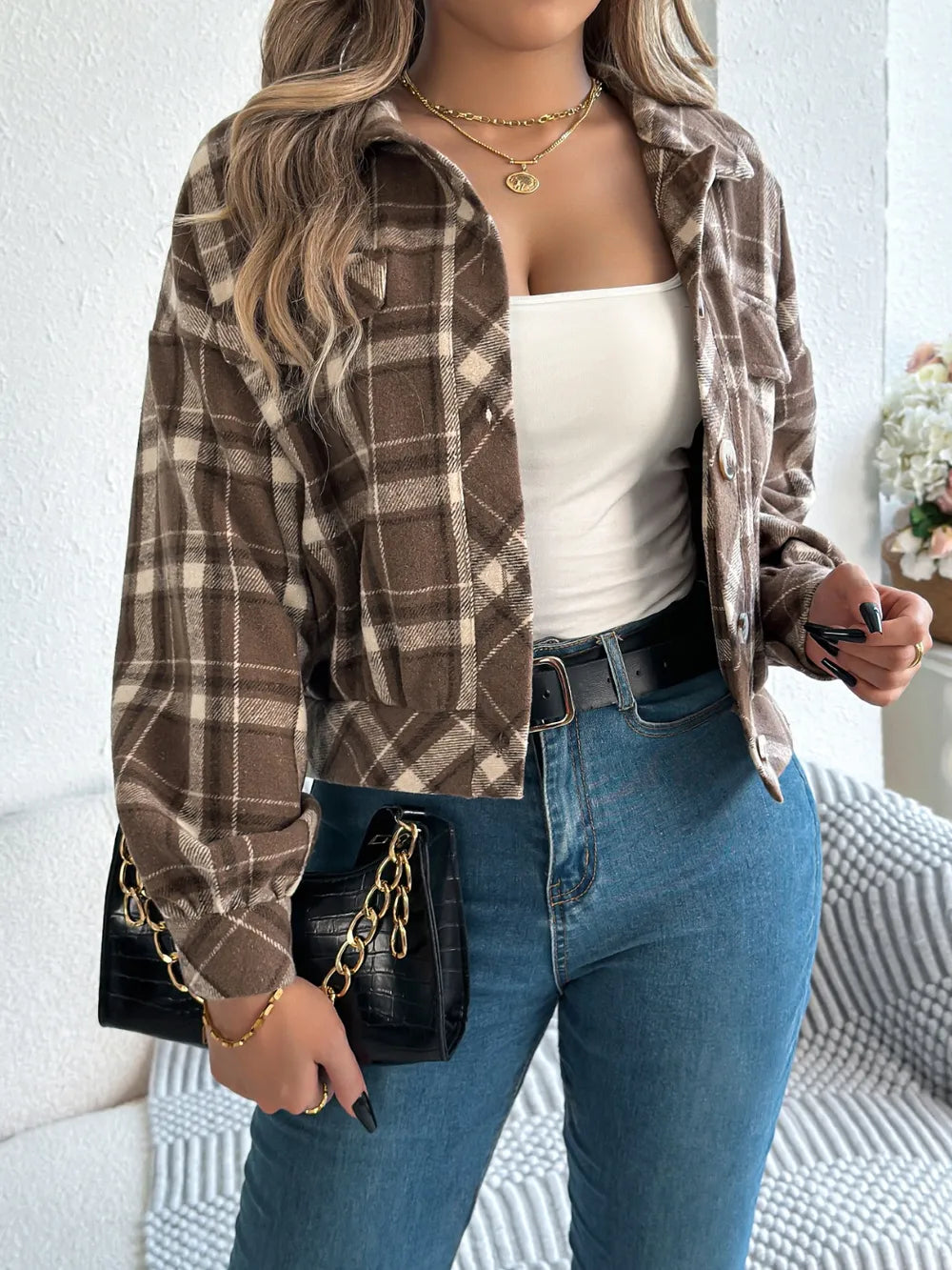 Taupe plaid button-up long sleeve jacket with snap front and rolled cuffs
