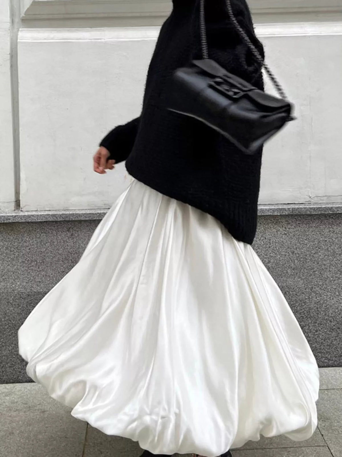 White satin maxi skirt with back zipper and voluminous gathered tiers