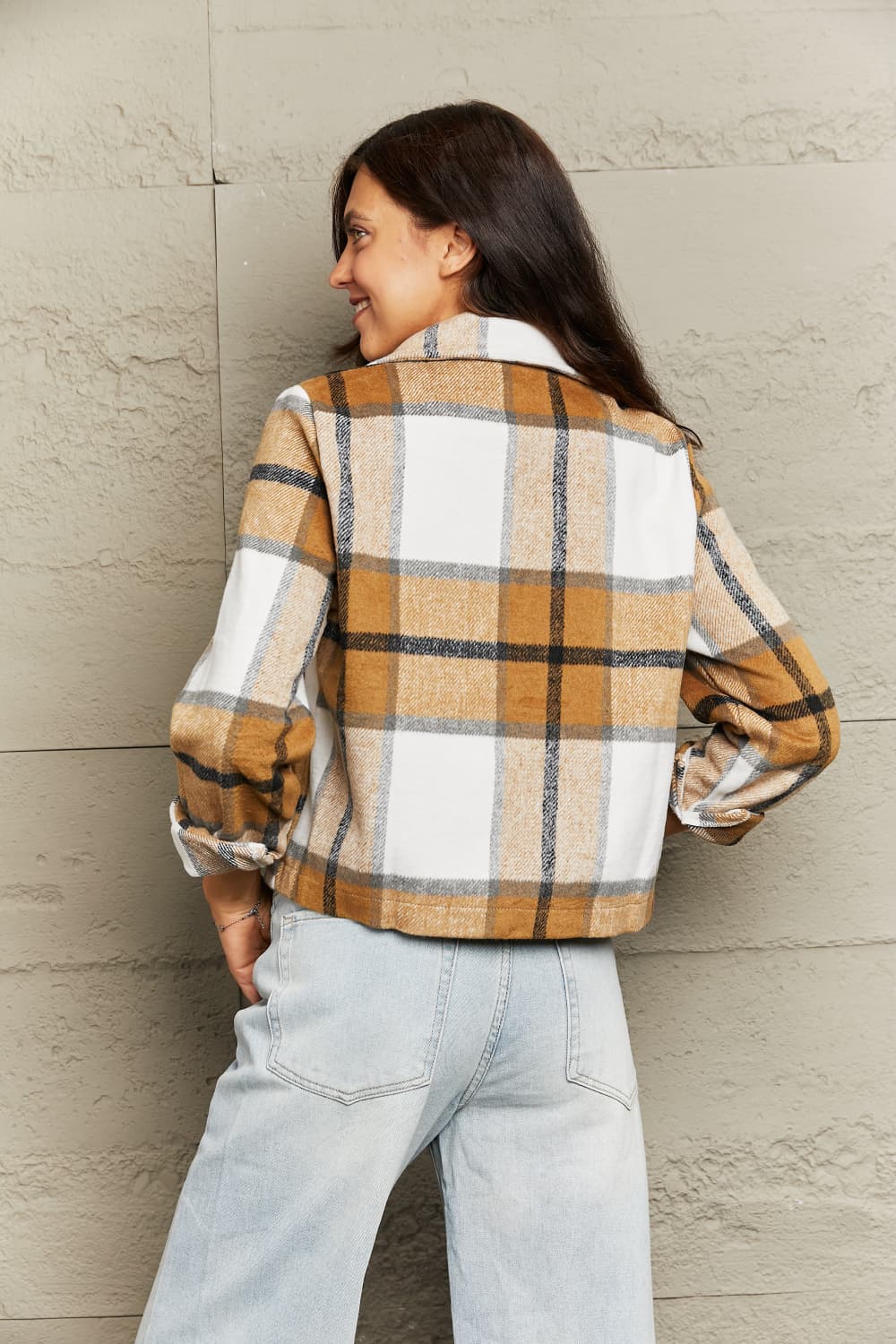 Camel plaid collared jacket with button front and fleece-trim cuffs, back view