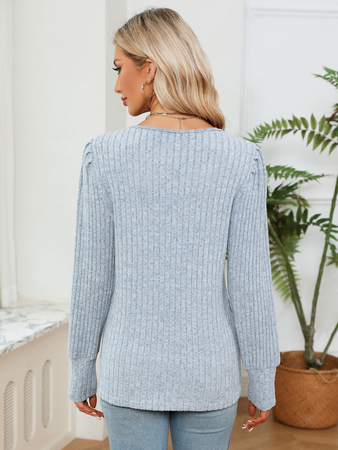 Misty blue ribbed knit blouse, back view with long sleeves and crew neckline