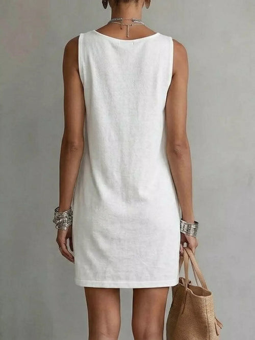 White sleeveless mini dress, straight back, no sleeves