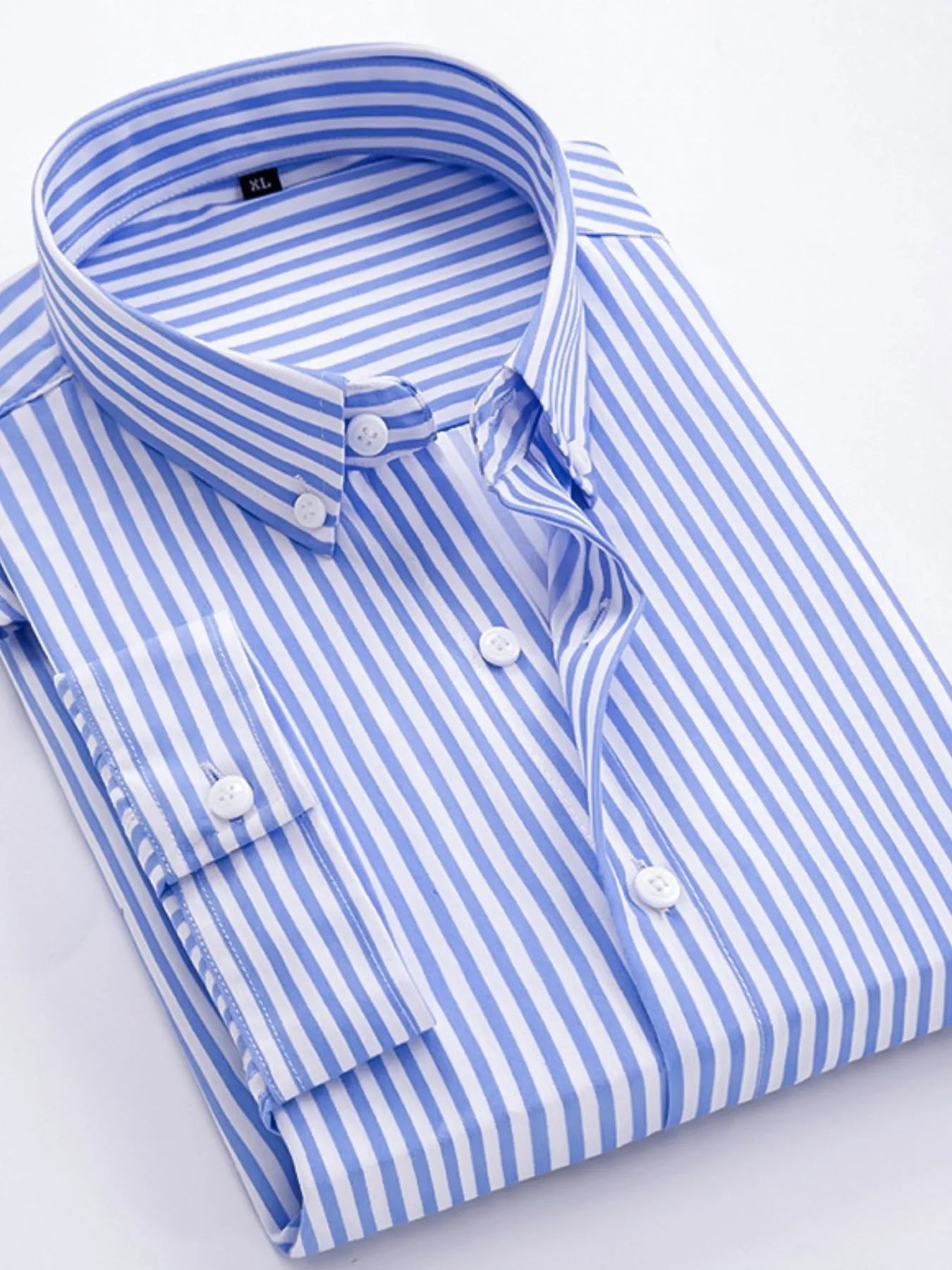 Striped button-up long-sleeve shirt in light blue and white with white button front