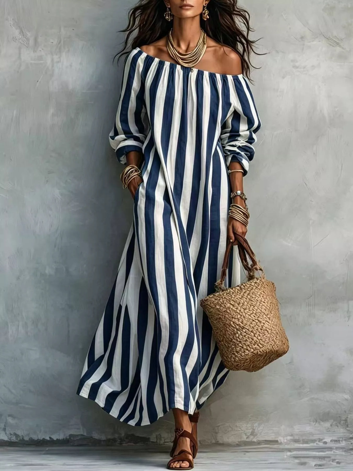 Navy and white striped off-shoulder maxi dress with gathered neckline and long sleeves
