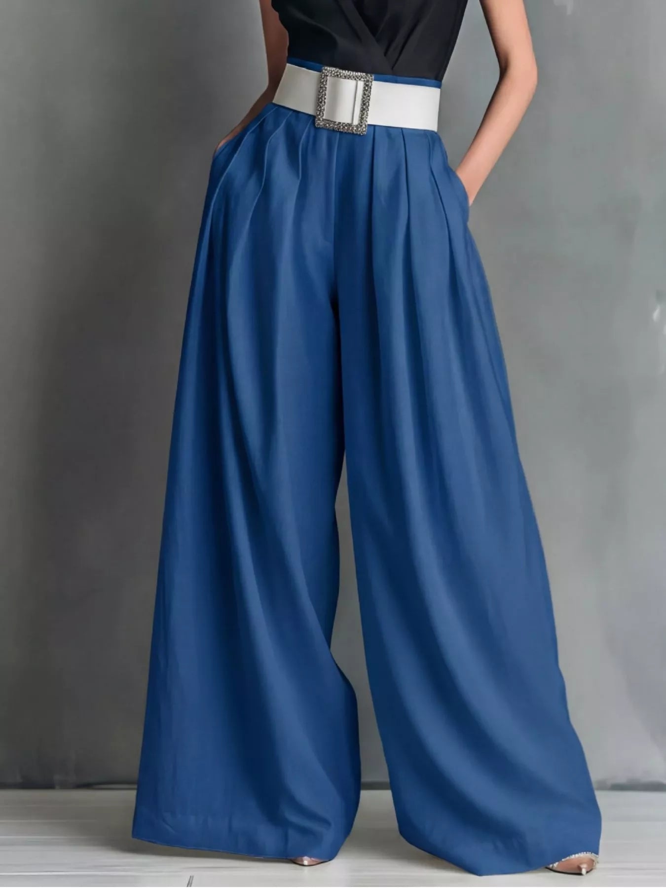 Blue high-waisted wide-leg pants with belt band and square buckle at waist