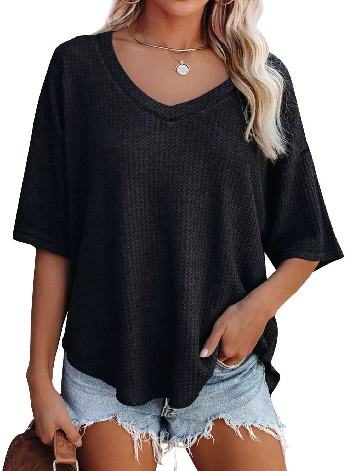 Waffle knit V-neck short-sleeve T-shirt in black, loose fit