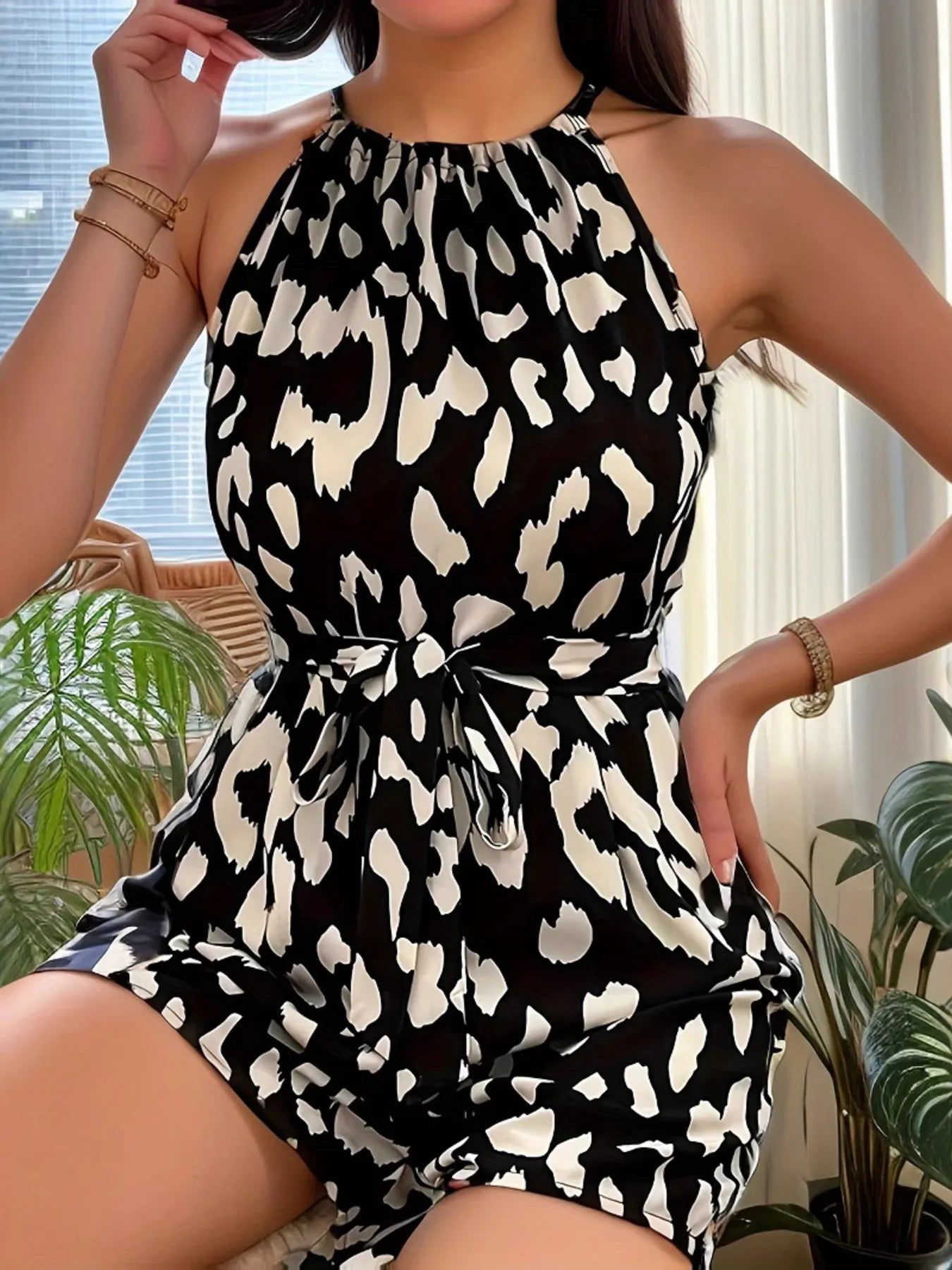 Leopard print halter neck belted romper with gathered waist and ruched neckline