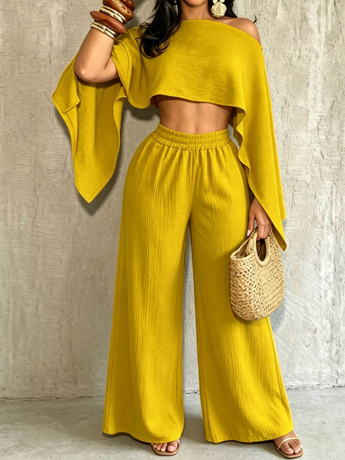 Yellow boat-neck crop top with wide-leg pull-on pants, flowing matching set.
