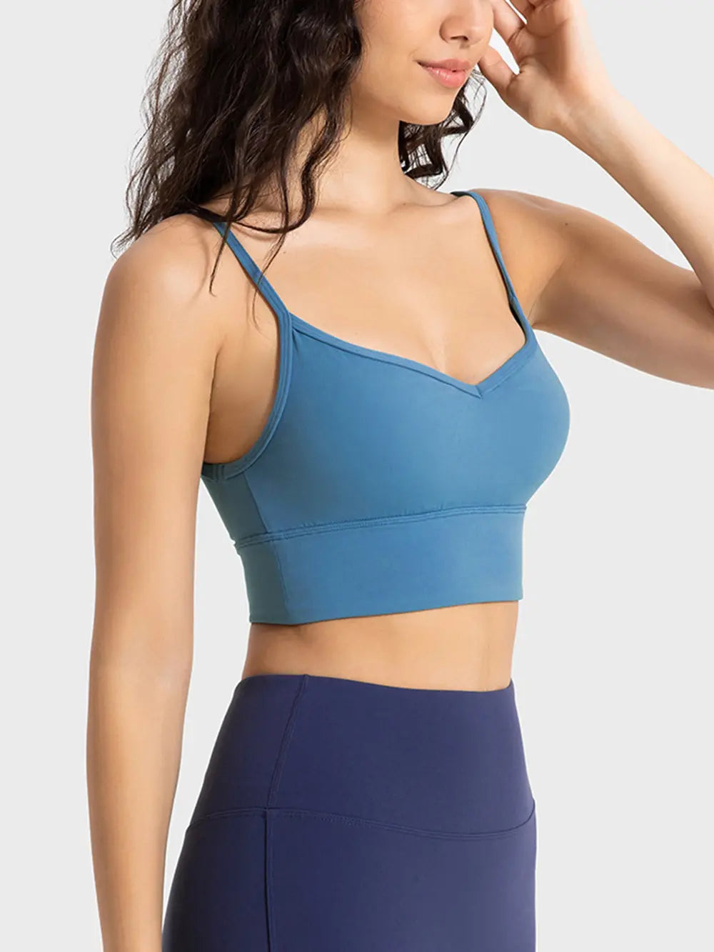 Cerulean spaghetti strap sport bra with smooth V-neck and wide band