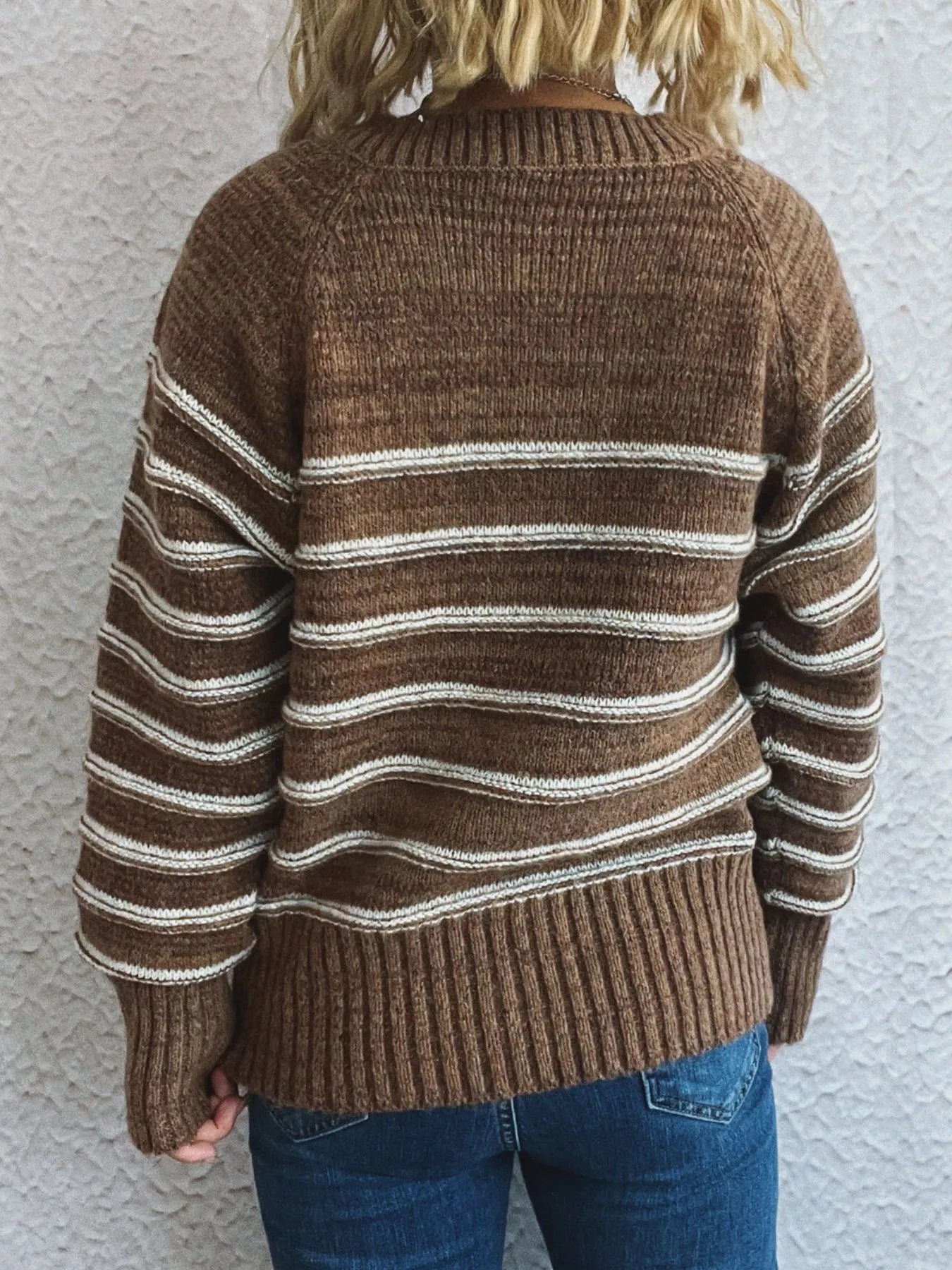 Back view brown striped long sleeve sweater with ribbed knit hem and cuffs