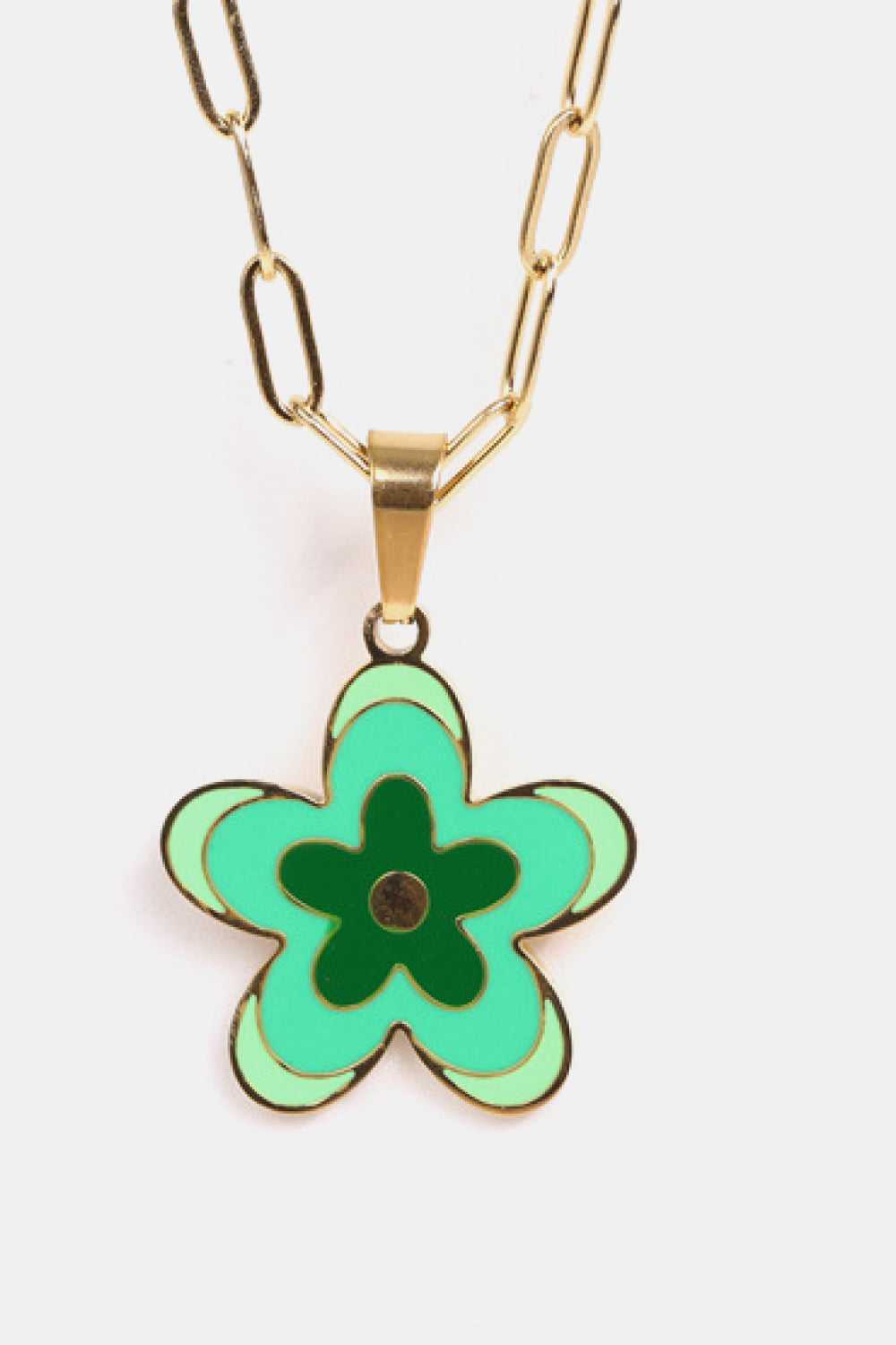 Gold-tone flower pendant necklace with green enamel five-petal flower pendant