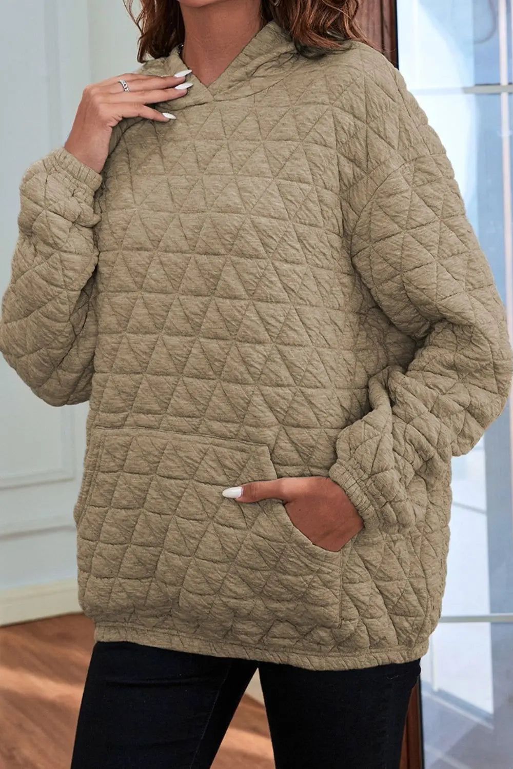 Khaki quilted long-sleeve hoodie with hood and front pocket