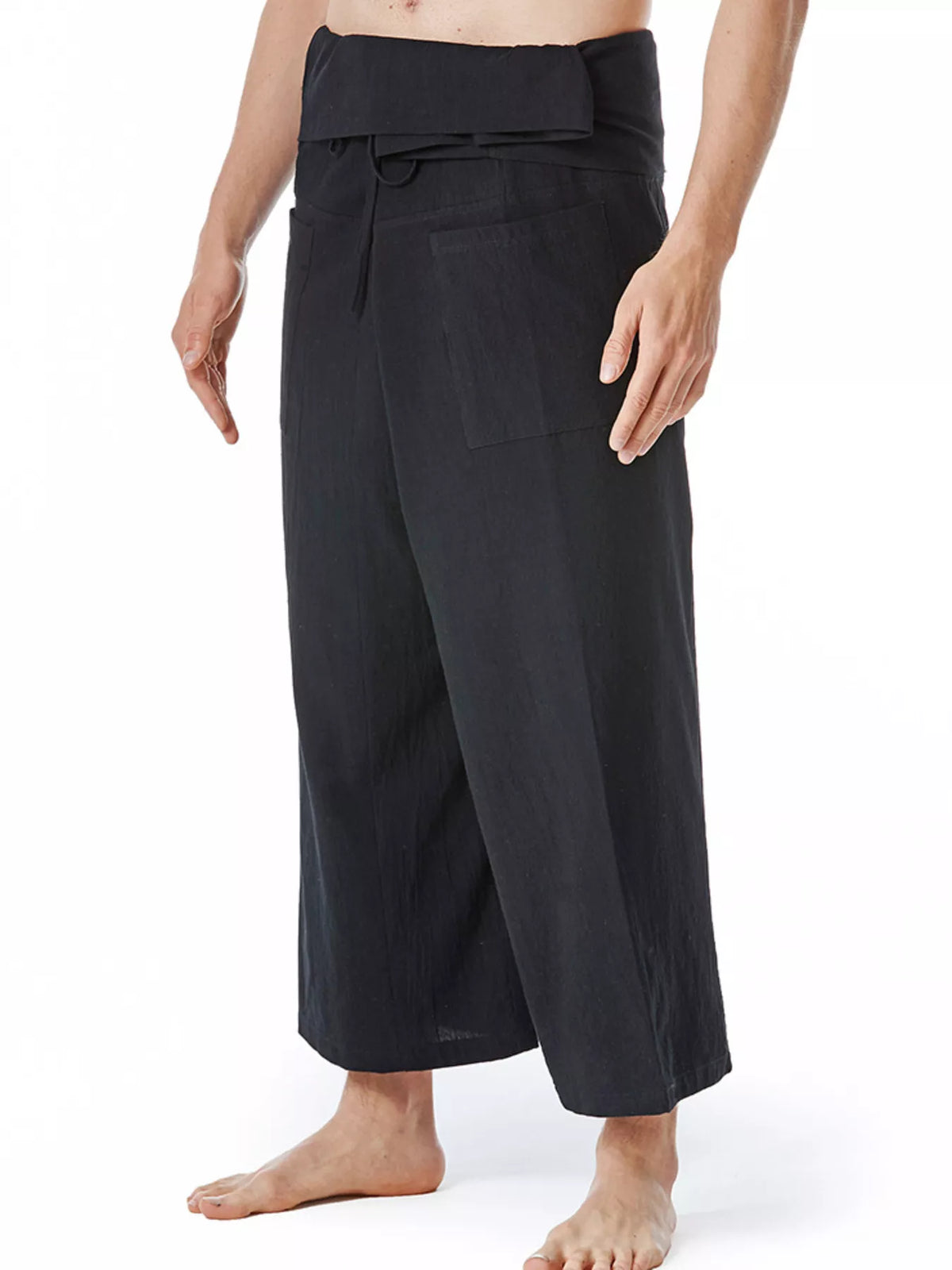 Black loose-fit drawstring pants, back view with wide straight legs