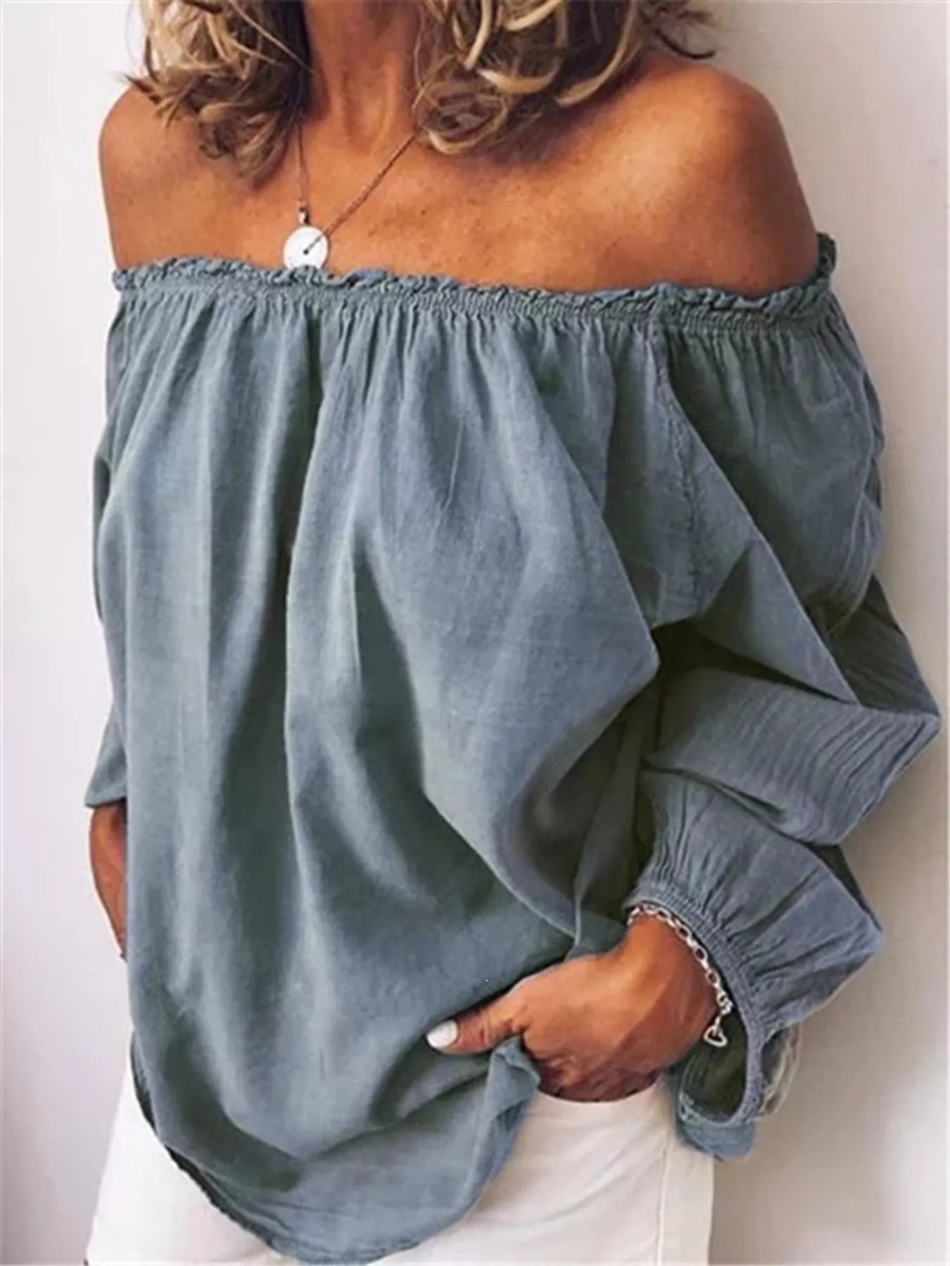 Off-shoulder frill-trim blouse in dusty teal, elastic neckline, loose long sleeves