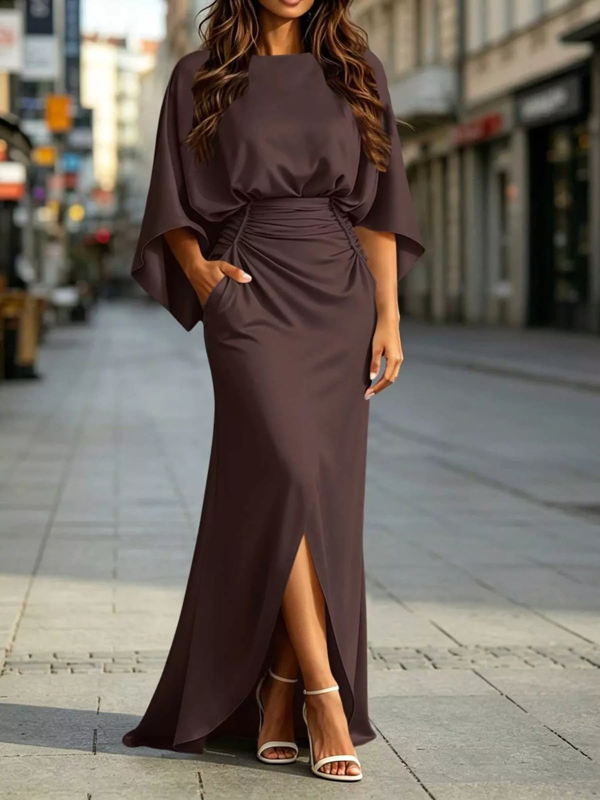 Taupe satin maxi dress with ruched waist, dolman sleeves, and front slit