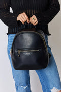 Black vegan leather mini backpack with top handle and front zip pocket