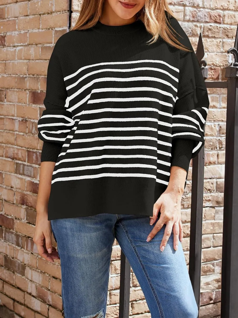 Black long-sleeve sweatshirt with round neck and white horizontal stripe panel