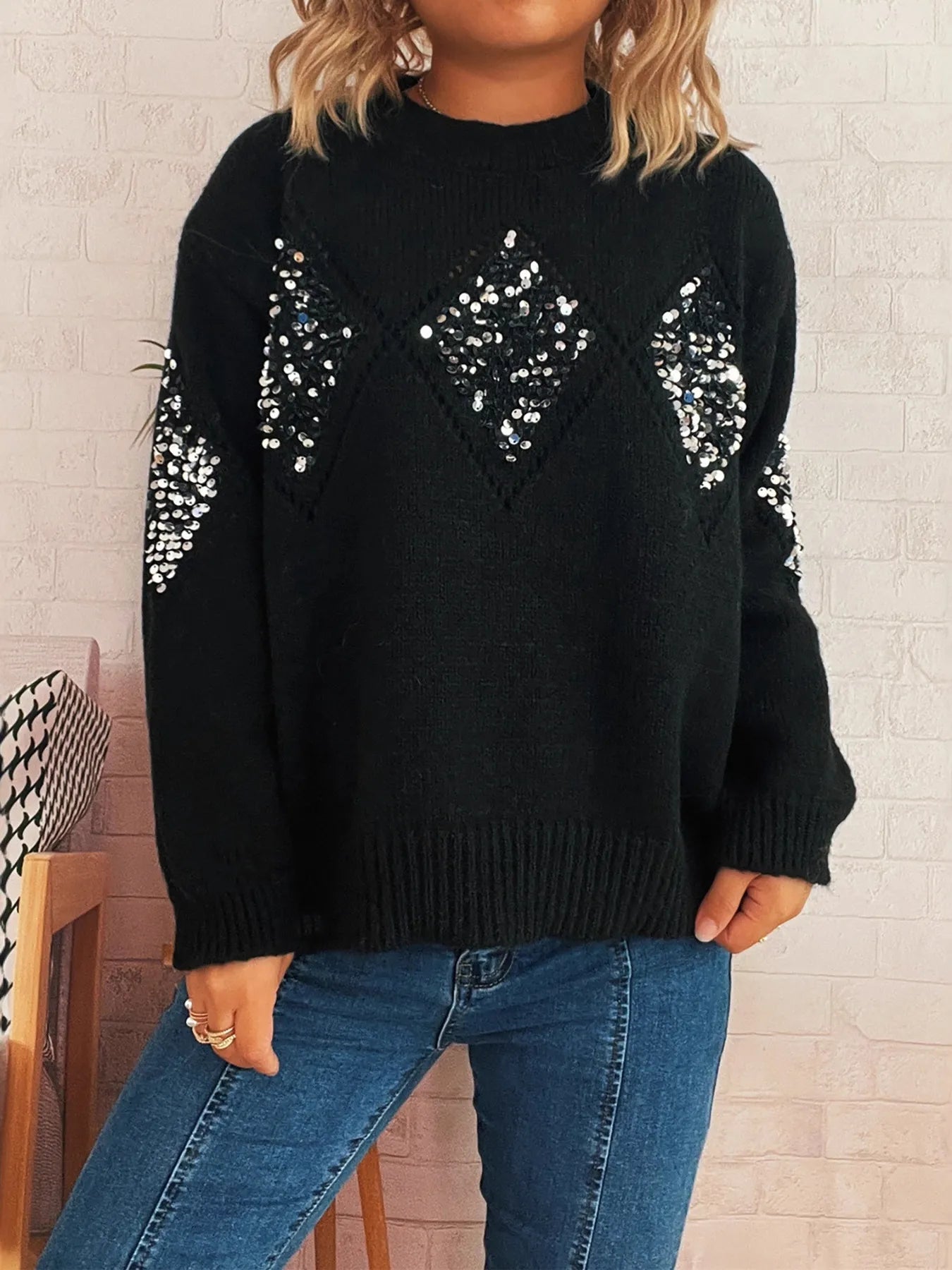 Black oversized sweater with sequined diamond pattern on chest and sleeves