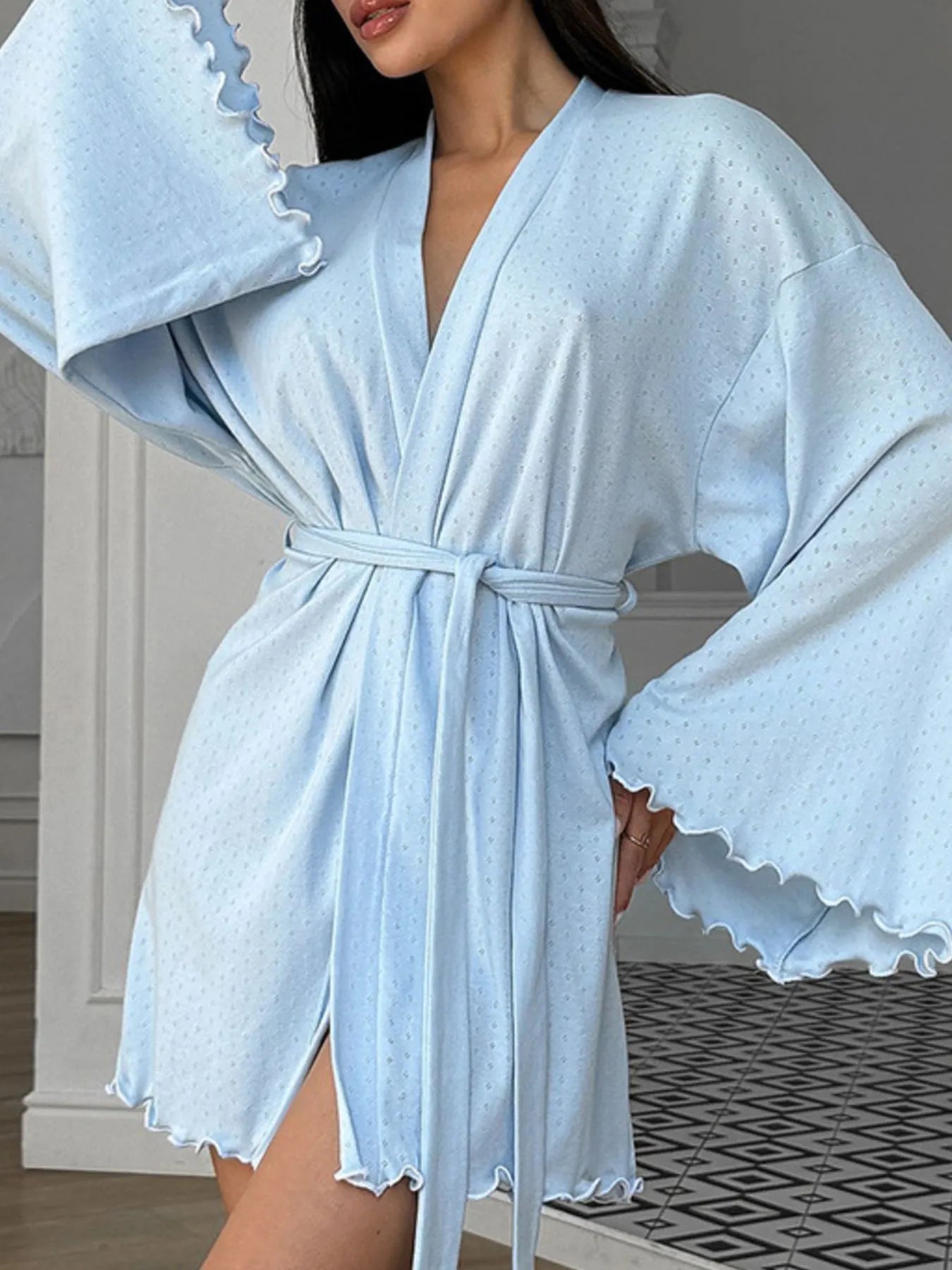 Light blue tie-waist kimono nightgown with textured fabric and tied waist belt