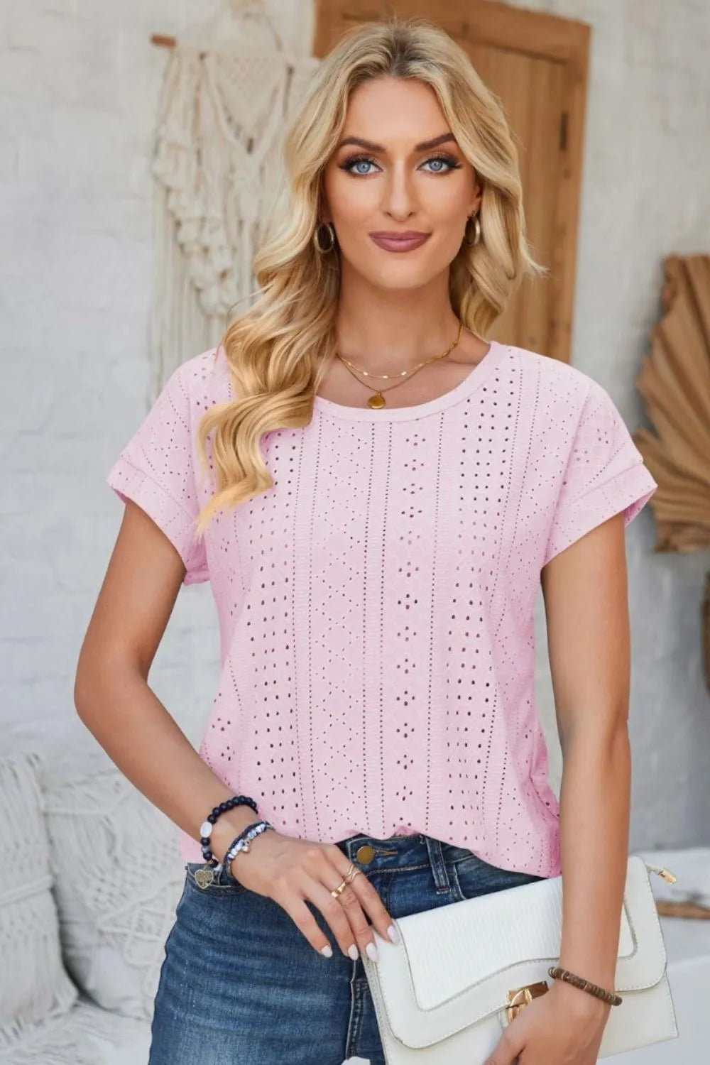 Eyelet round-neck rolled short-sleeve T-shirt in blush pink with vertical cutout pattern
