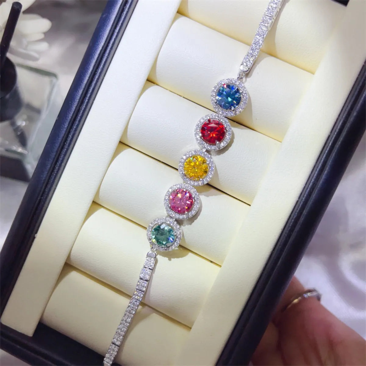 925 sterling silver bracelet with multicolor round gemstone charms, shown in case