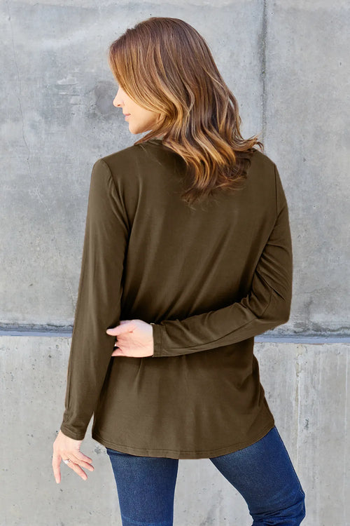 Dark olive V-neck long-sleeve top, side view with straight hem